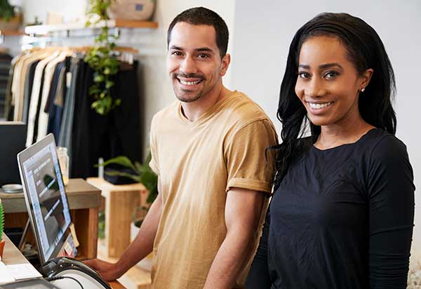 You deserve to be proud of your business website and the business it generates for you. Two proud business owners