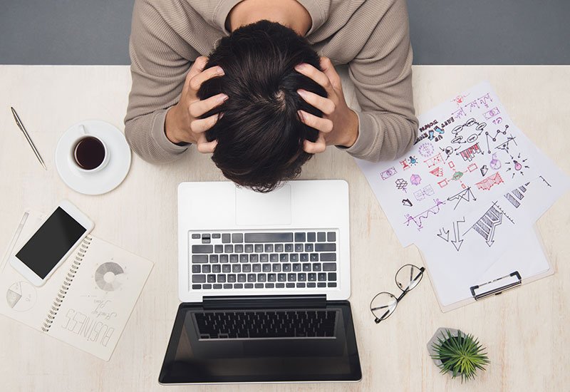Business owners could face large fines without proper website privacy compliance measures
business owner holding head in his hands